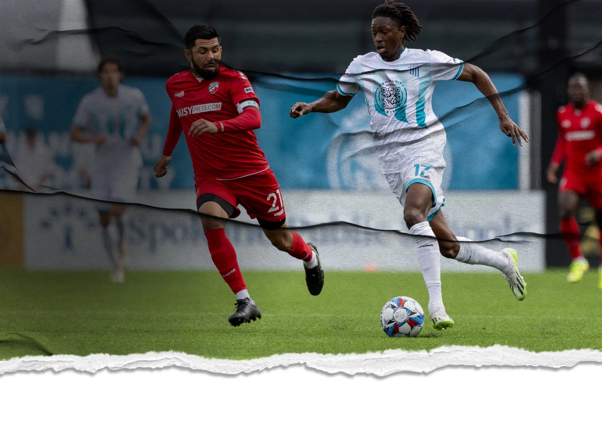 Spokane Velocity FC player running past a defender during a match